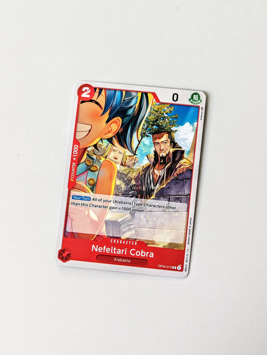 One Piece Op04 Kingdoms Of Intrigue Nefeltari Cobra Op04-012 C Card [Eng 🏴󠁧󠁢󠁥󠁮󠁧󠁿] Trading Card